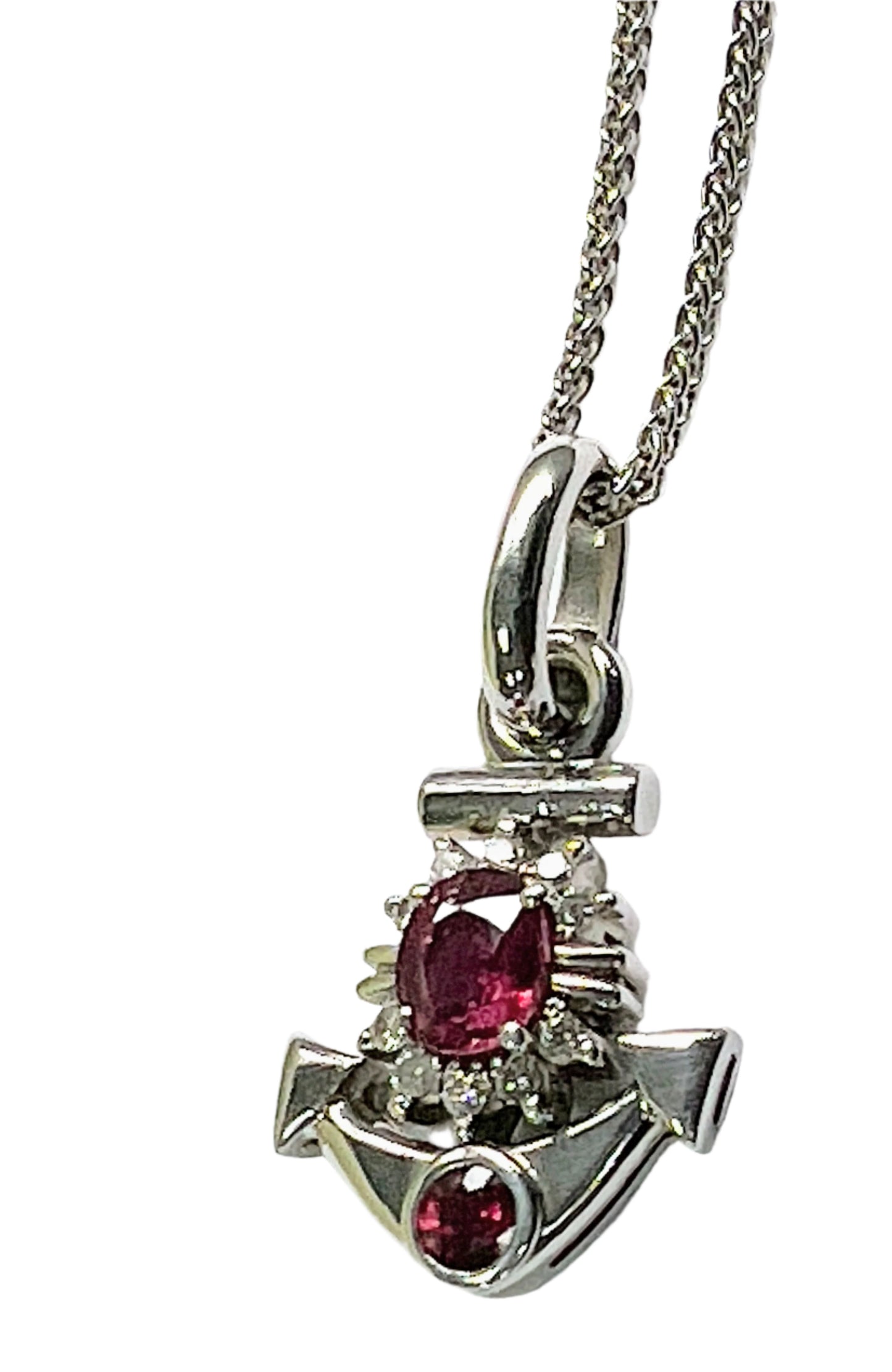 Natural Ruby & Diamond Anchor Pendant Necklace in Platinum Coated Silver with handcrafted detailing and vibrant ruby stones on a fine chain.