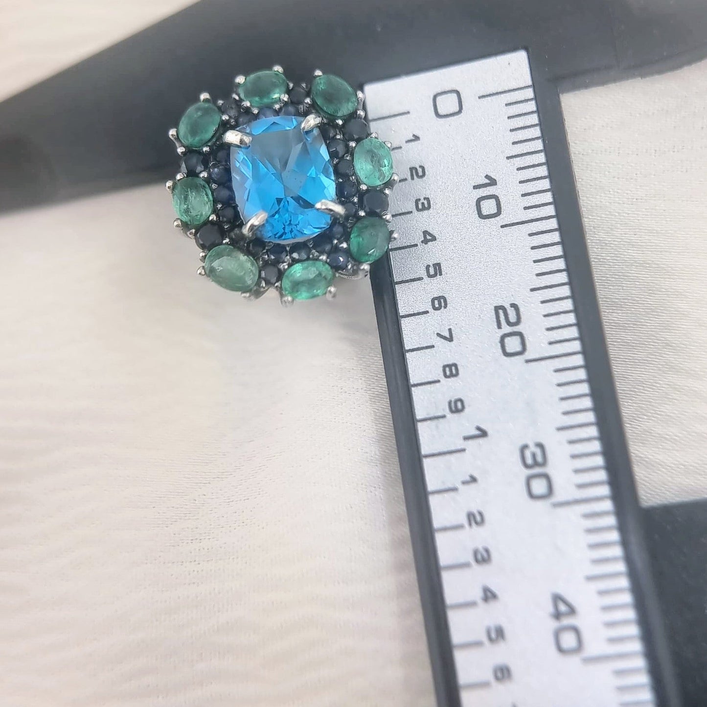 Natural Topaz Emerald & Sapphire Platinum Earring measured with ruler, indicating size and scale for accurate jewelry shopping.