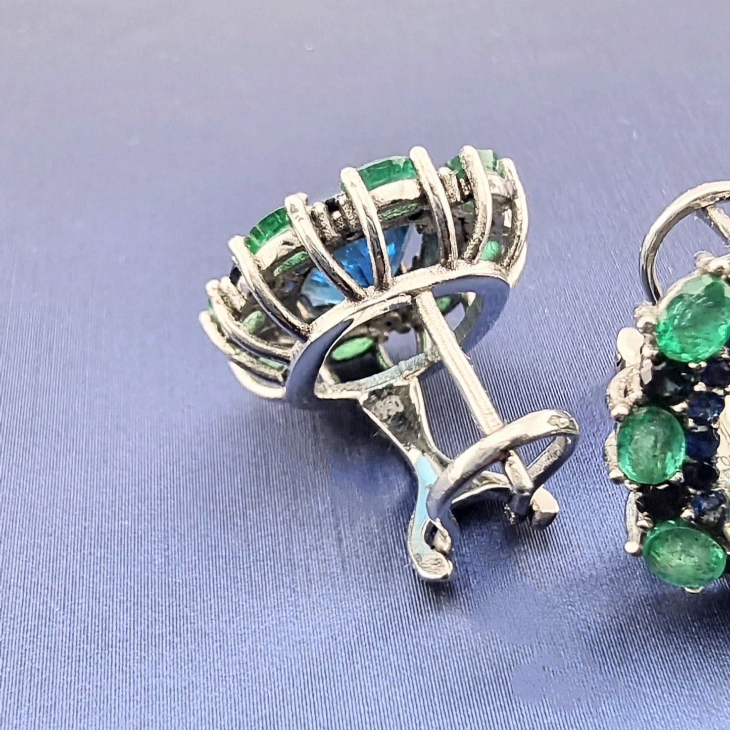 Side view of Natural Topaz Emerald & Sapphire Platinum Earrings showing detailed platinum setting and secure clip-on mechanism.