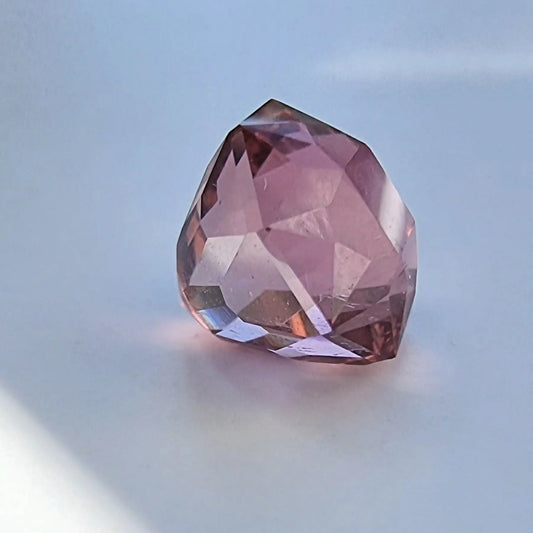 Loose 5.28ct pink tourmaline gemstone with an octagonal cut, showcasing a brilliant natural hue. Perfect for collectors and fine jewelry settings.