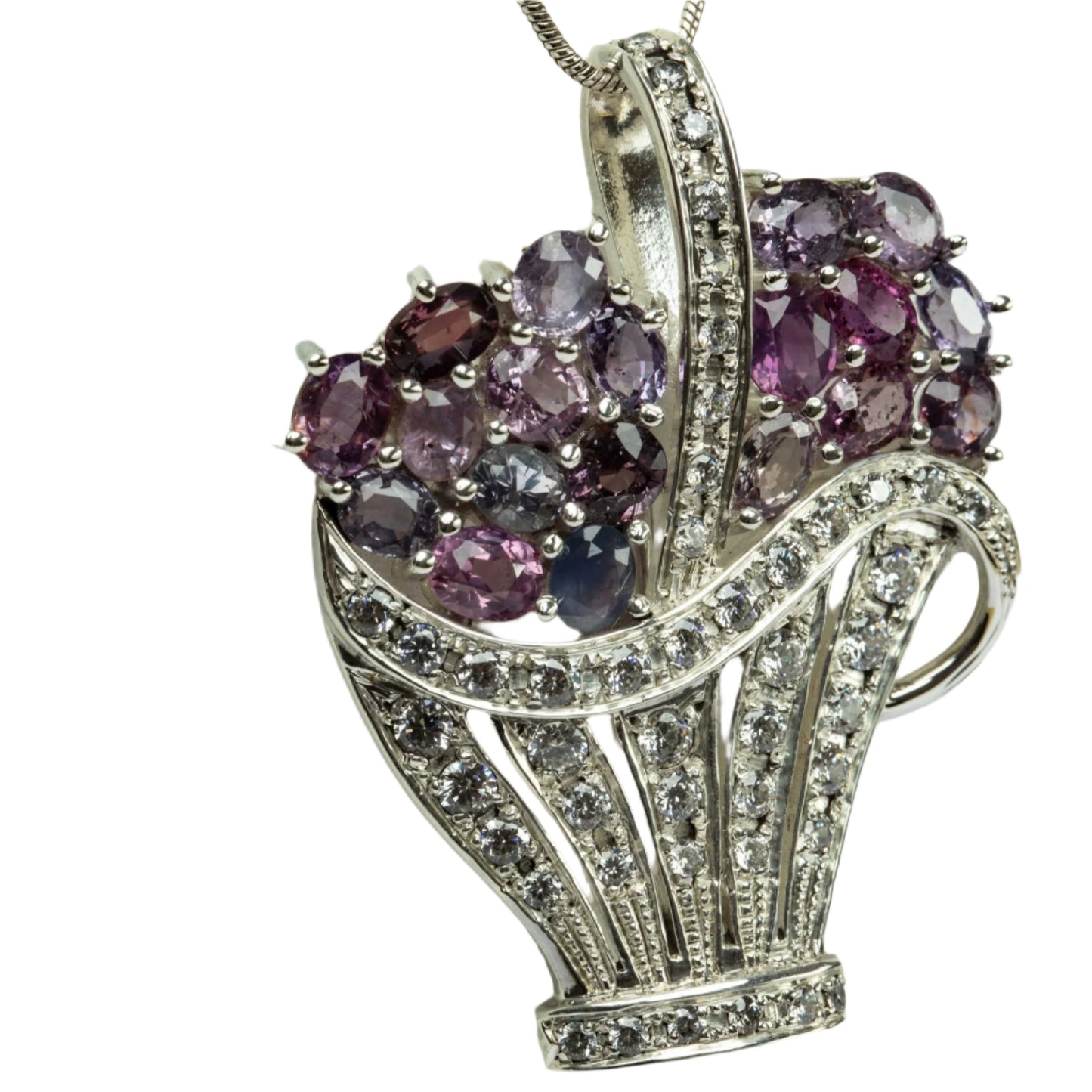 Close-up of Pink Sapphire Brooch Pendant with vivid natural sapphires and zircon detailing, perfect for luxury jewelry enthusiasts.