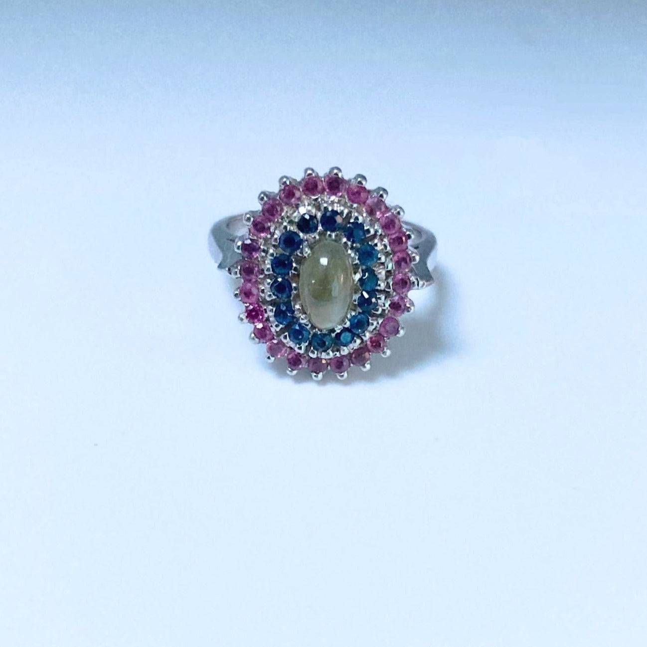Front view of the Natural Cat's Eye Chrysoberyl and Sapphire Cocktail Ring, showcasing its exquisite gemstone arrangement and elegant craftsmanship.
