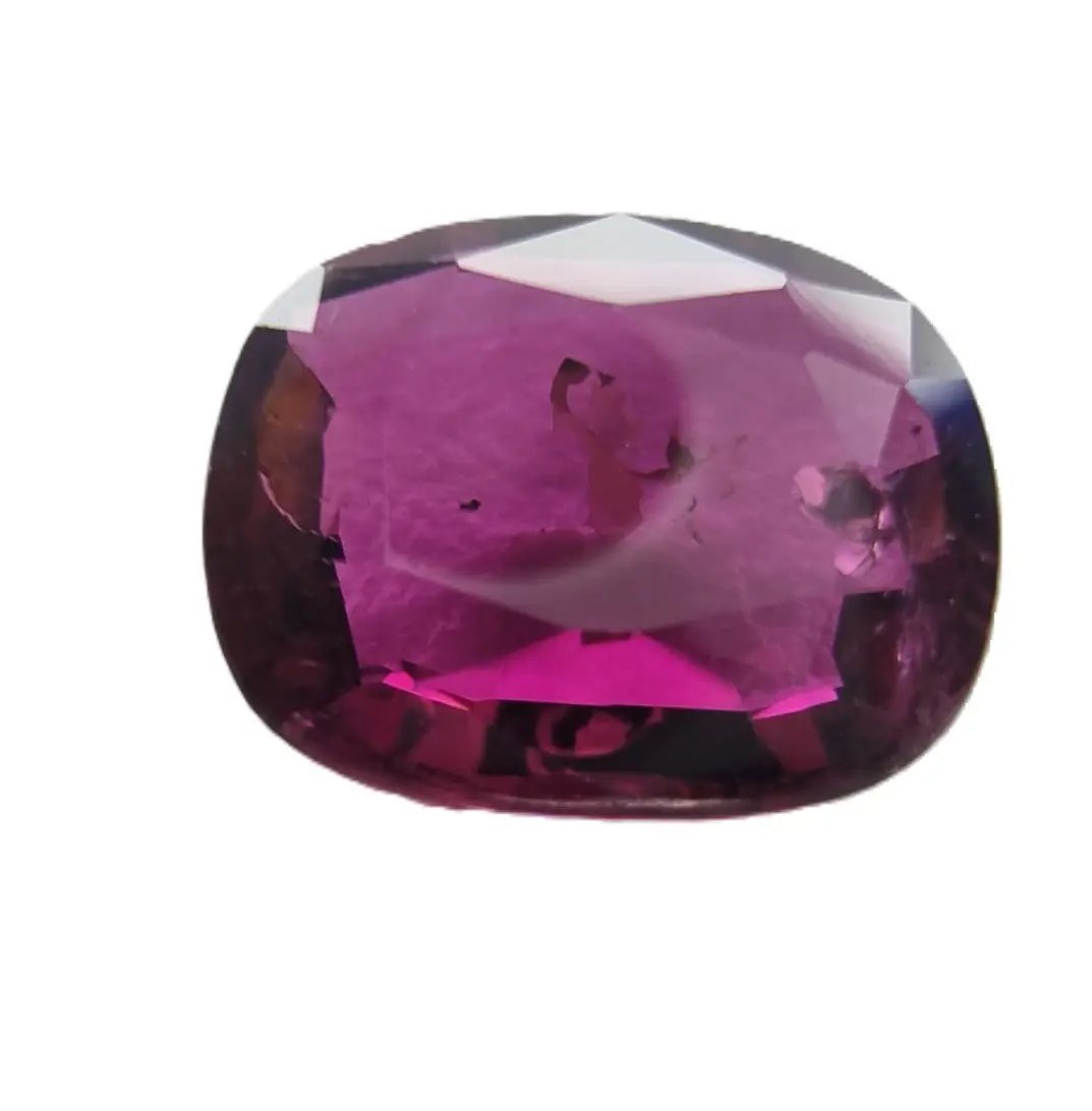 Exquisite 4.03ct cushion cut rubellite tourmaline gemstone featuring a rich pinkish-red color, perfect for high-end jewelry settings.