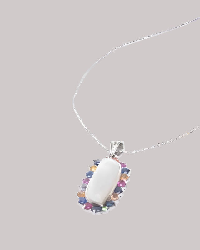 a necklace with a white stone surrounded by multicolored stones