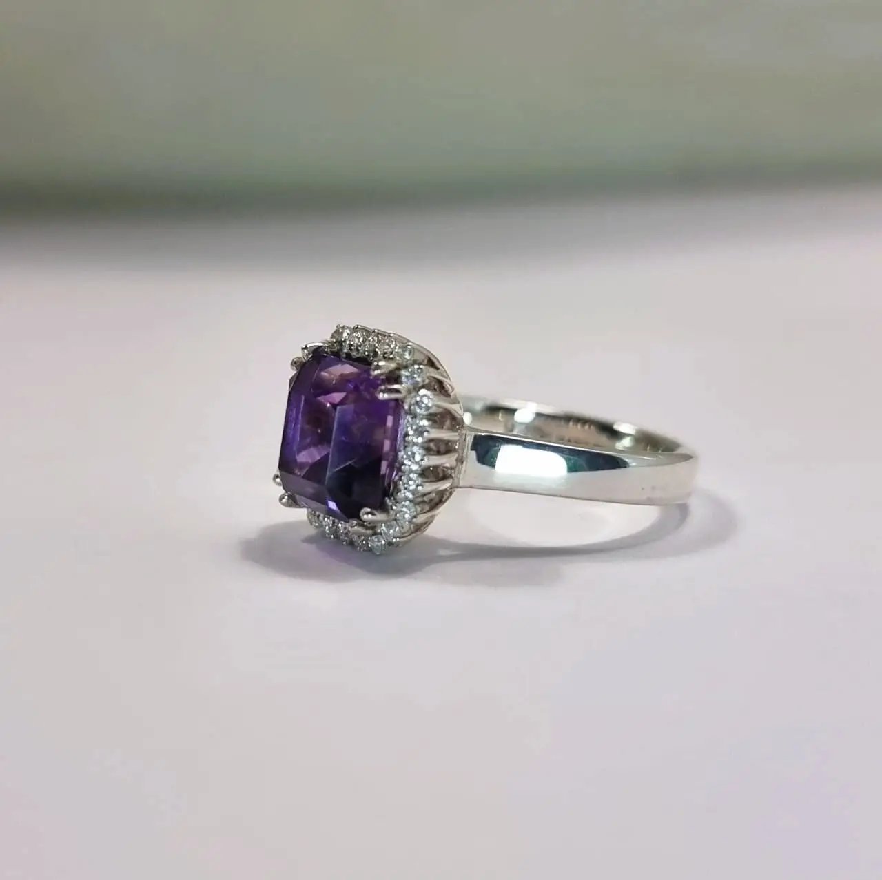 a close up of a ring on a table