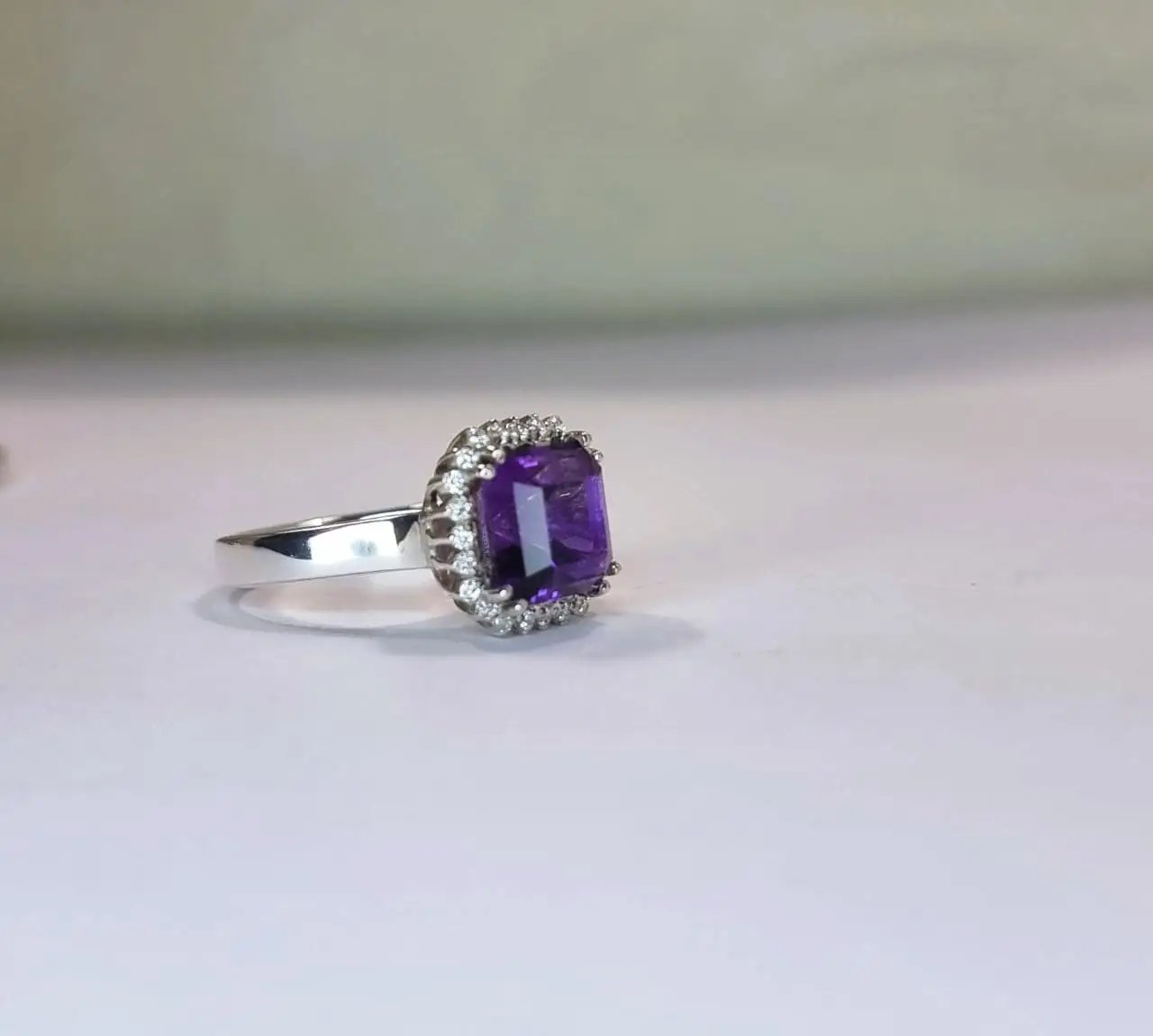 a close up of a ring on a table