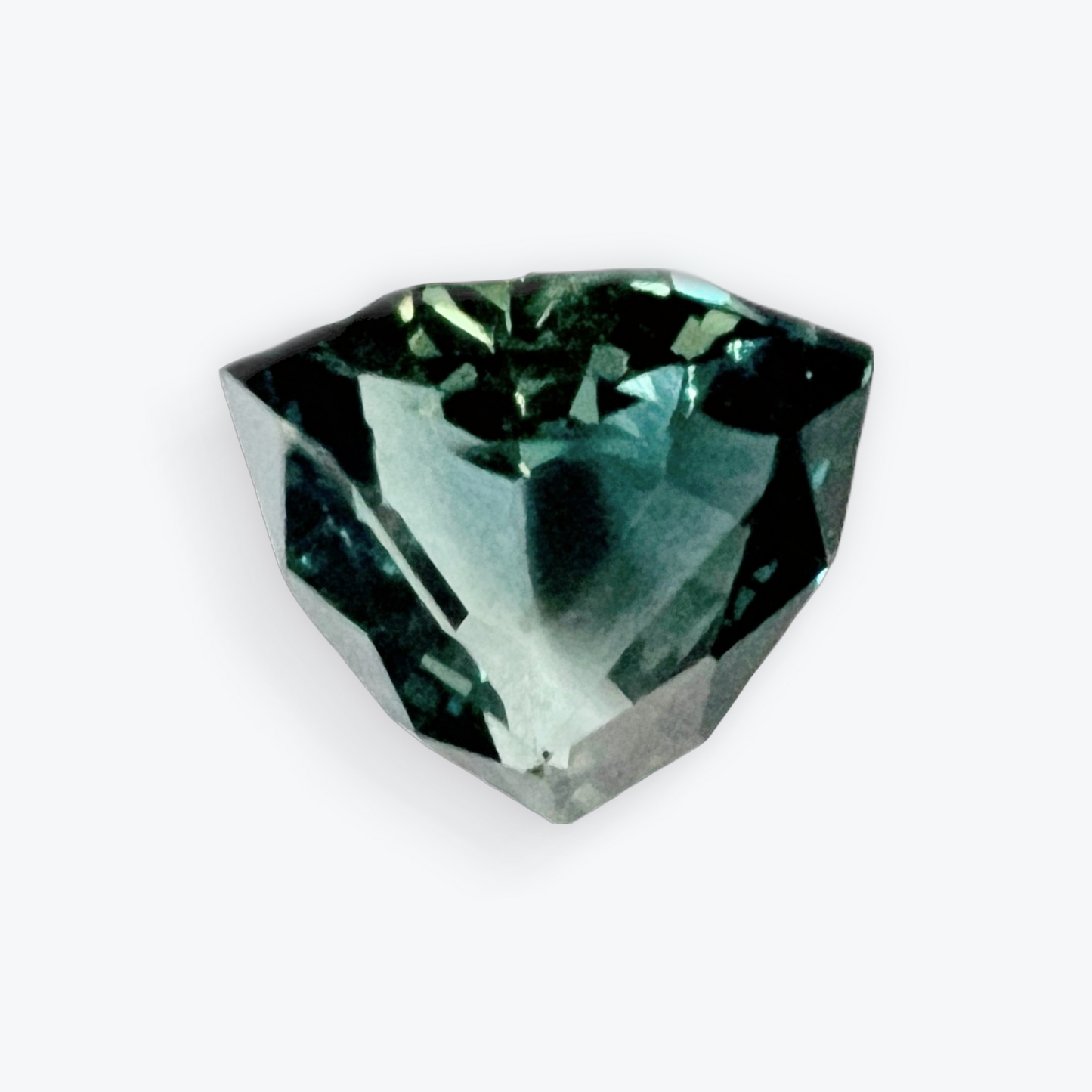 0.5ct Trillion Cut Teal Blue Sapphire Gemstone