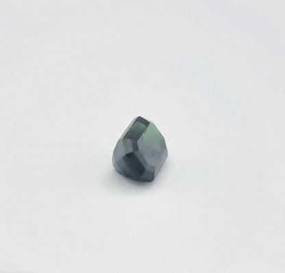 Angled view of rectangular greenish blue sapphire 1.84 ctw, revealing its natural color blend and fine craftsmanship for collectors.