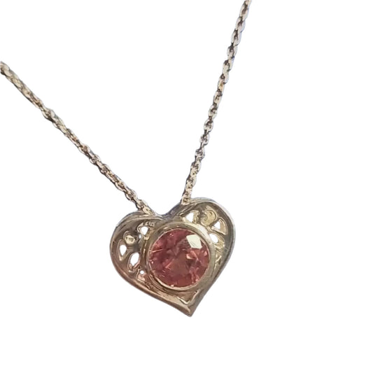 Gold Heart Pendant - Tourmaline Gold Heart necklace featuring a 4ct pink tourmaline set in 18K gold with filigree detailing. Ideal for romantic gifting.