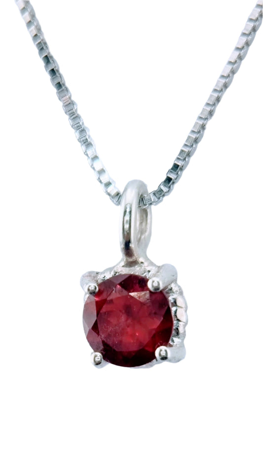 Garnet Pendant Sterling Silver - Twist Design featuring a 6mm round garnet in a prong setting with Italian chain, perfect for elegant styling.