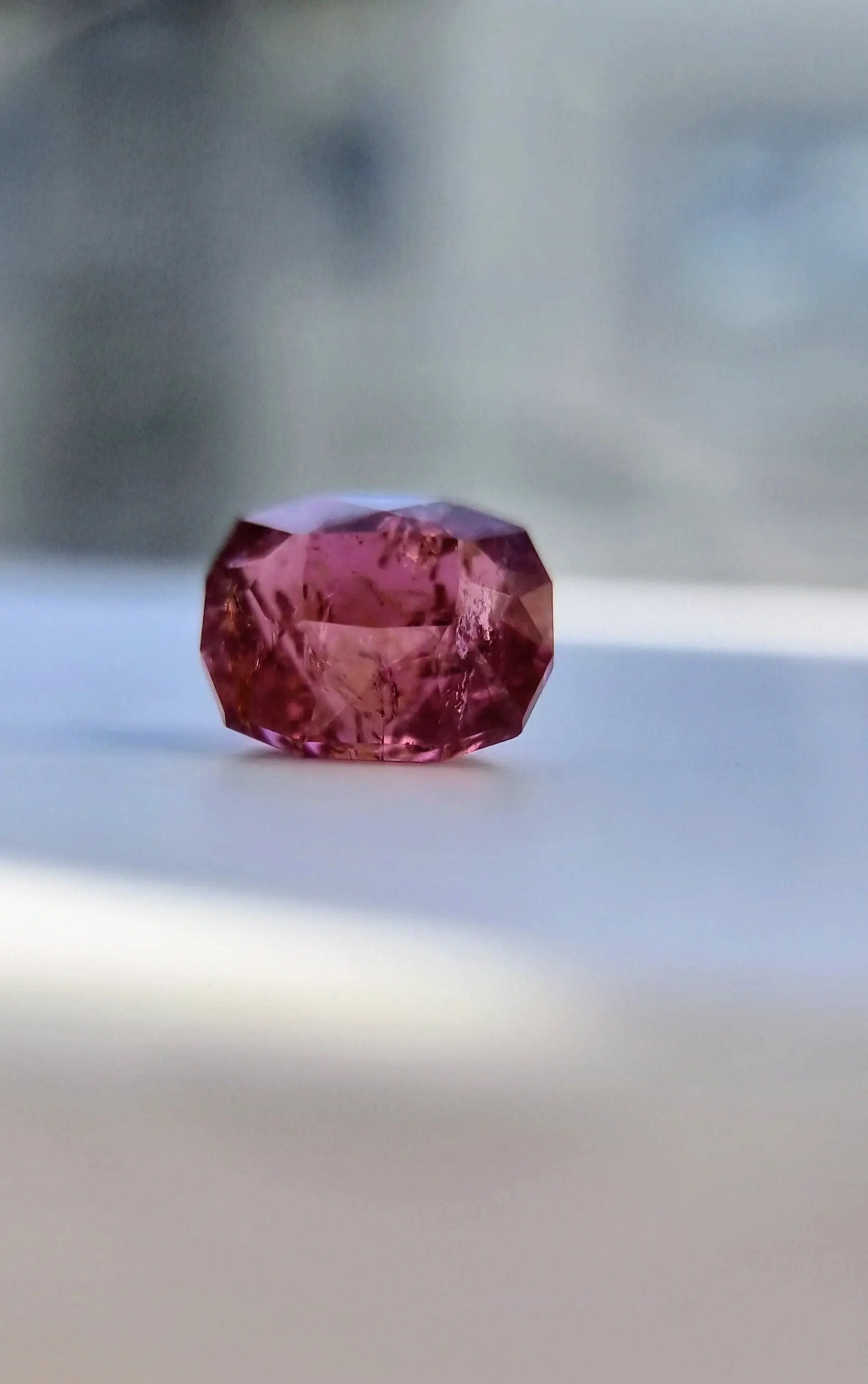 7.42ct Pink Tourmaline Gemstone with cushion cut, glowing in soft pink tones. A rare and meaningful gift for gemstone enthusiasts.