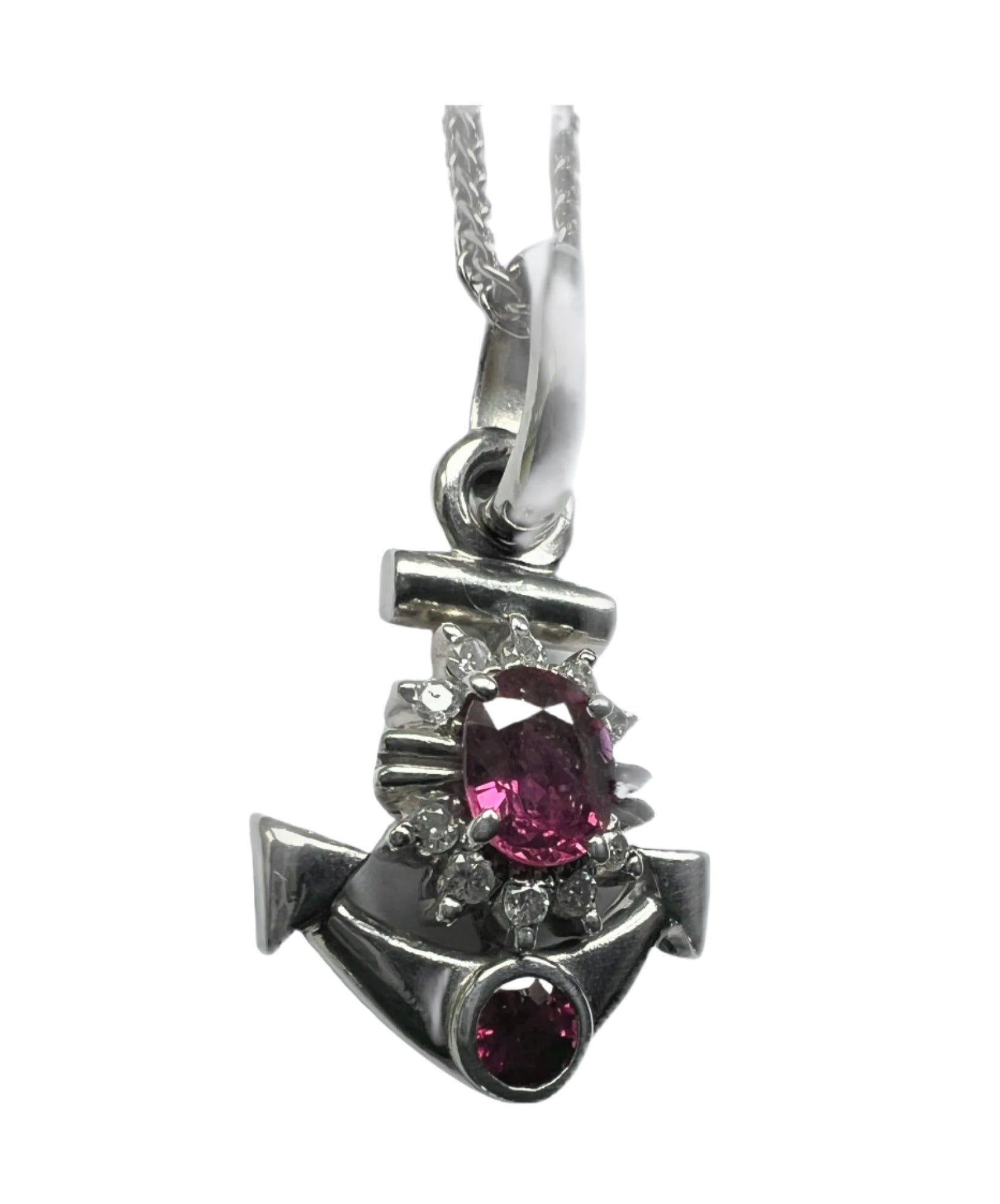 Angled view of Natural Ruby & Diamond Anchor Pendant Necklace in Platinum Coated Silver showcasing gemstone brilliance and anchor motif.