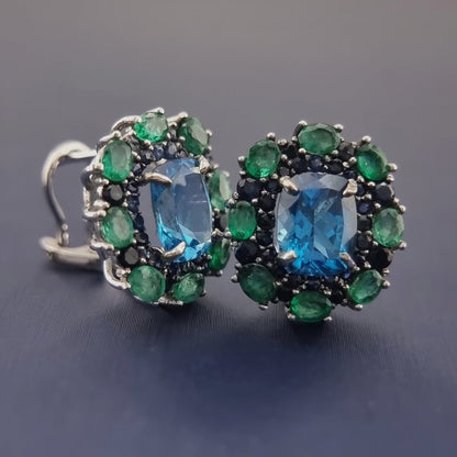 Close-up of Natural Topaz Emerald & Sapphire Platinum Earrings showing intricate gemstone arrangement and secure platinum clip-on backing.