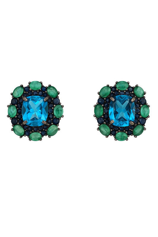 Natural Topaz Emerald & Sapphire Platinum Earrings featuring a vivid blue topaz center, surrounded by green emeralds and dark sapphires in a square halo design.