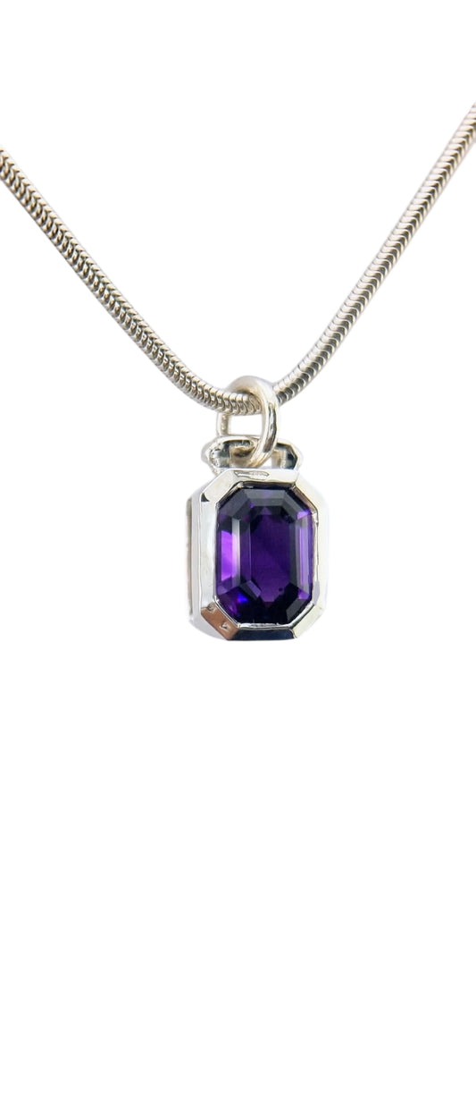 1.8ct emerald cut amethyst sailor pendant in sterling silver on snake chain, showcasing deep purple gemstone with nautical-inspired design.