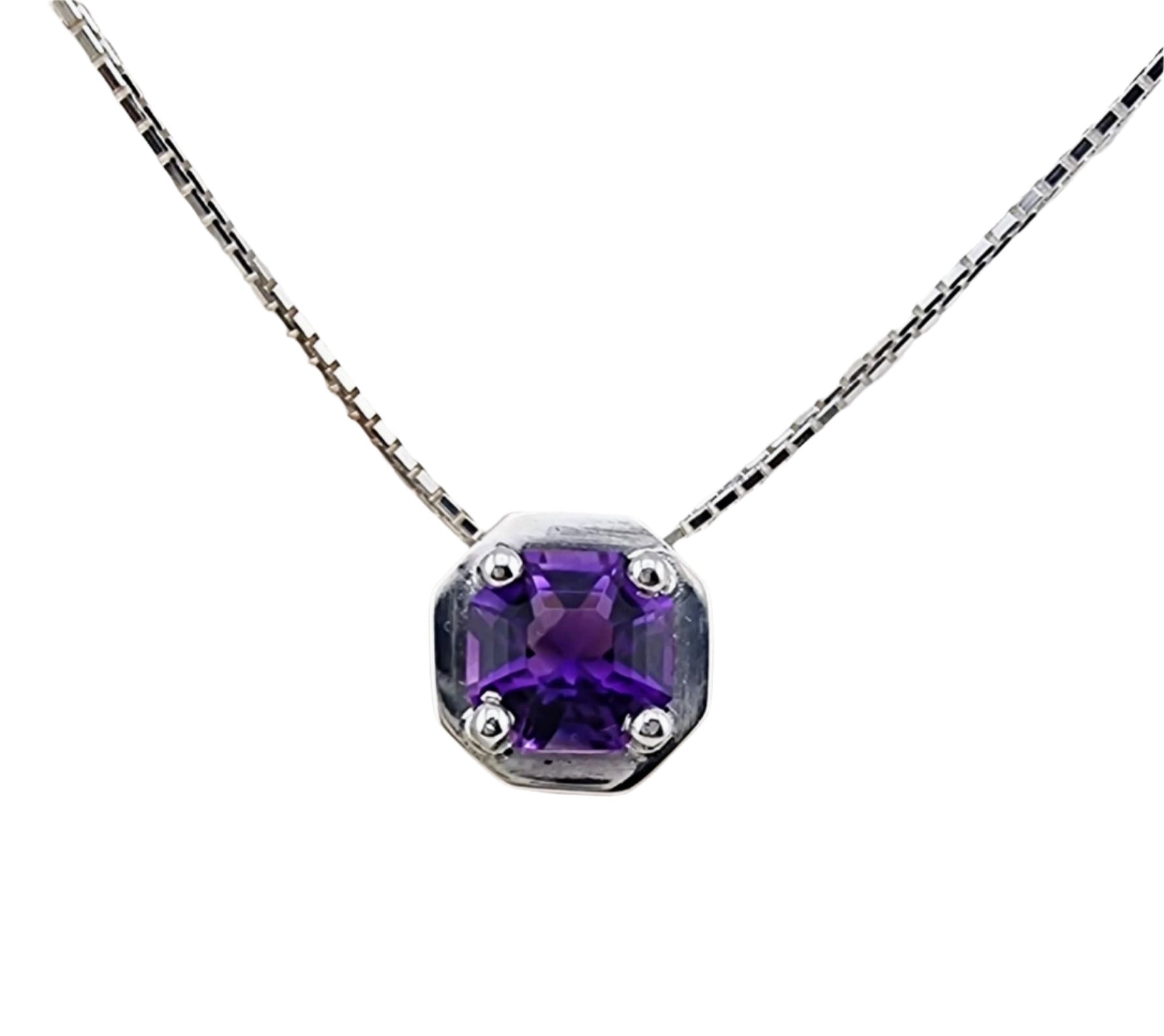 Amethyst pendant necklace in sterling silver featuring an octagonal purple gemstone on a box chain. Elegant jewelry for formal or casual wear.
