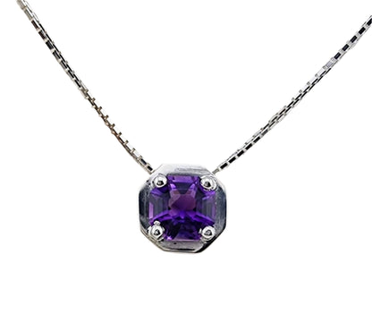 Amethyst pendant necklace in sterling silver featuring an octagonal purple gemstone on a box chain. Elegant jewelry for formal or casual wear.