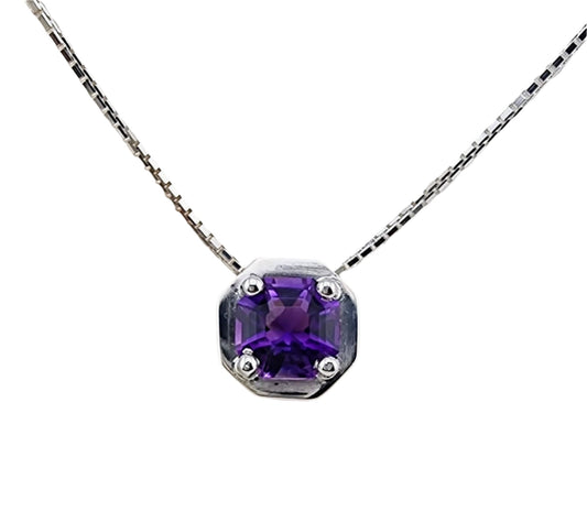 Amethyst pendant necklace in sterling silver featuring an octagonal purple gemstone on a box chain. Elegant jewelry for formal or casual wear.