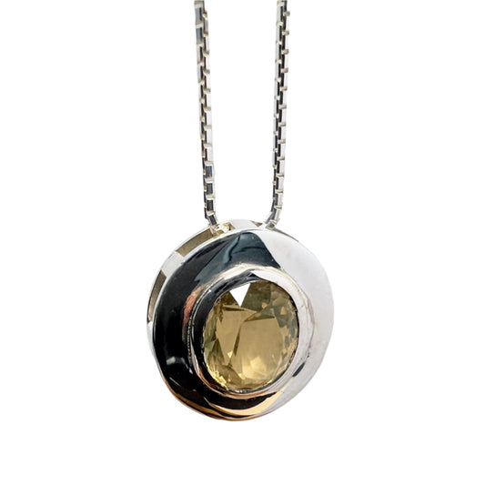 Citrine pendant necklace in sterling silver featuring a natural unheated gemstone with a modern circular bezel setting. Ideal for elegant daily wear.