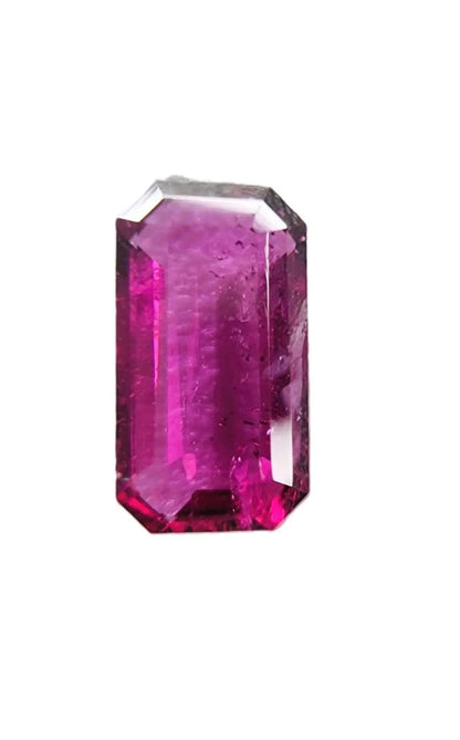 High-quality 3.02ct emerald cut red rubellite tourmaline gemstone with a rich pinkish-red tone, perfect for custom jewelry settings.