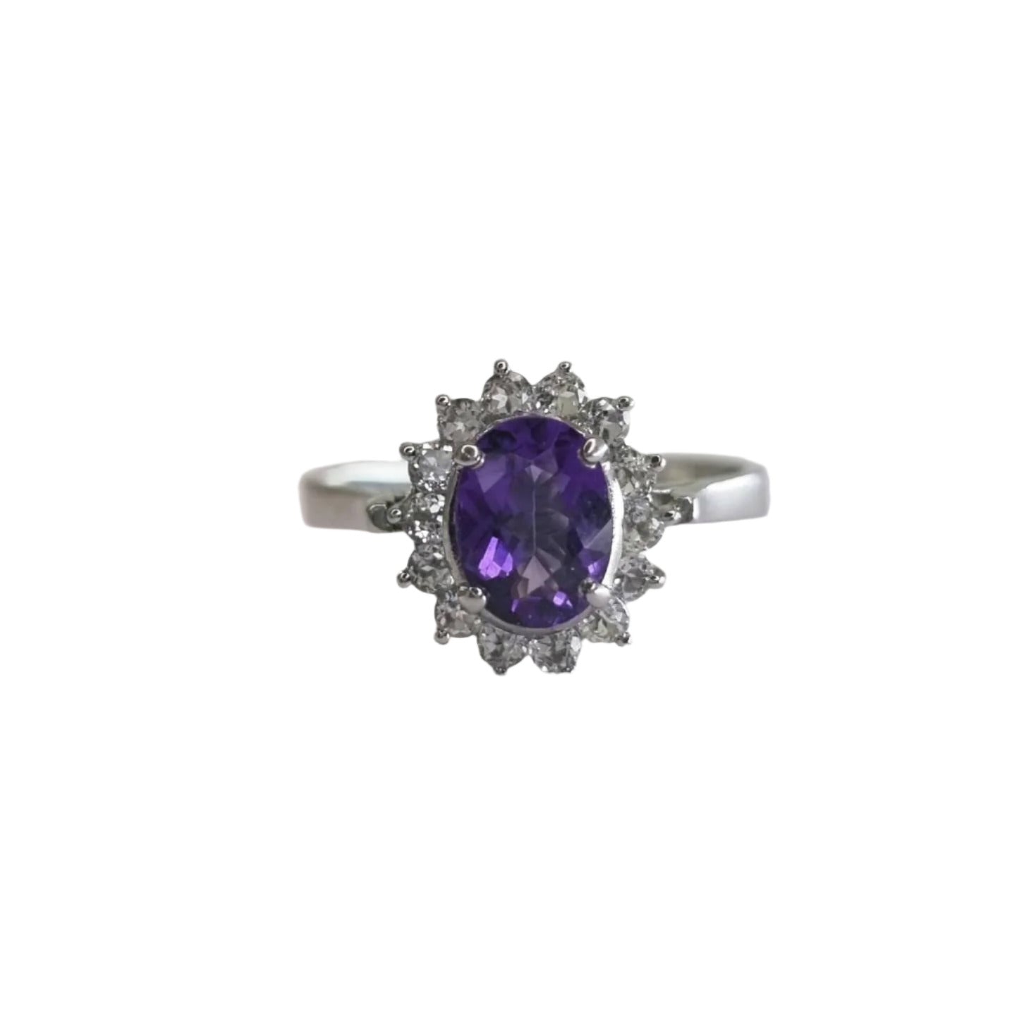 Front-facing view of a 2.0ct oval purple amethyst and white zircon ring, showcasing its brilliant sparkle and intricate halo design.