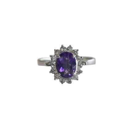 Front-facing view of a 2.0ct oval purple amethyst and white zircon ring, showcasing its brilliant sparkle and intricate halo design.