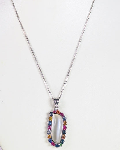 a necklace with a white stone surrounded by multicolored stones